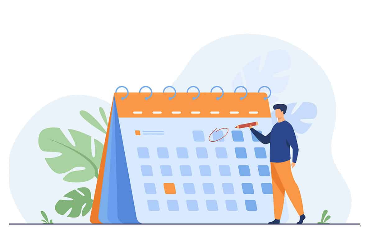 Manager señalando fecha calendario. MENTORAES hace coaching para mejorar el liderazgo con paciencia